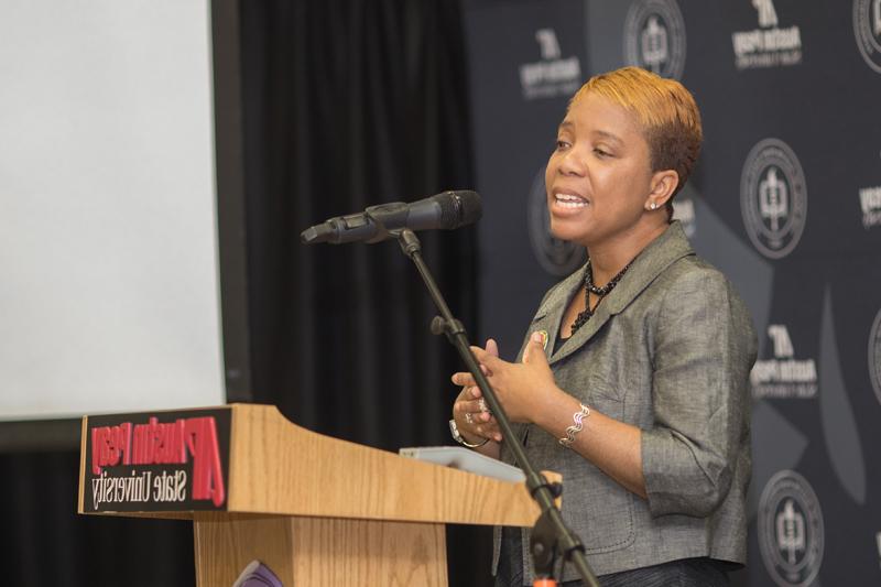 Marsha Lyle-Gonga speaks at Young Women's Leadership Symposium